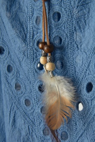 Luźna bluzka bogato zdobiona pióra - M