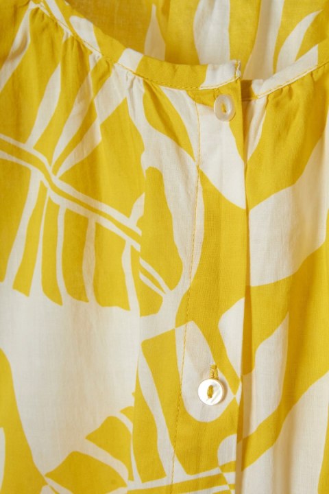 Wyjątkowa bluzka koszulowa motyw liści 38