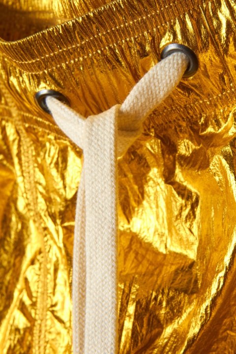 TOM REBL wyjątkowe włoskie spodnie metaliczny złoty kolor luźny krój L