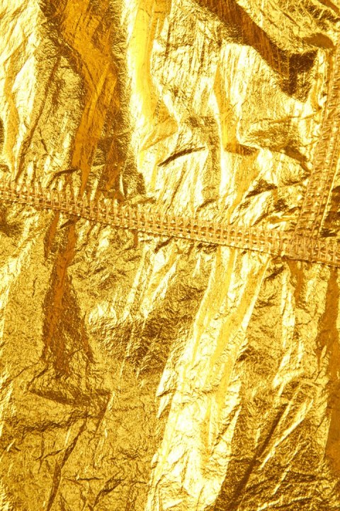 TOM REBL wyjątkowe włoskie spodnie metaliczny złoty kolor luźny krój L