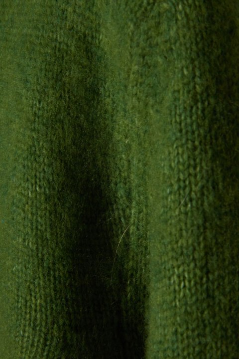 NN.07 nieziemsko mięciutki sweter wełna merynosa piękna zieleń M