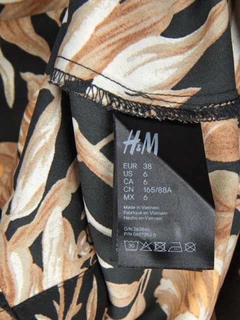 H&M - cudowna luźna bluzka piękny wzór na ciemnej butelkowej zieleni - 38